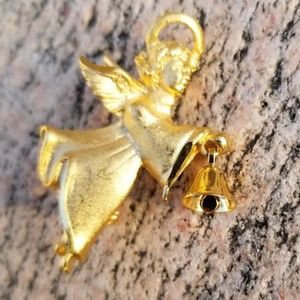 Vintage Robyn Rush Gold tone angel with bell brooch